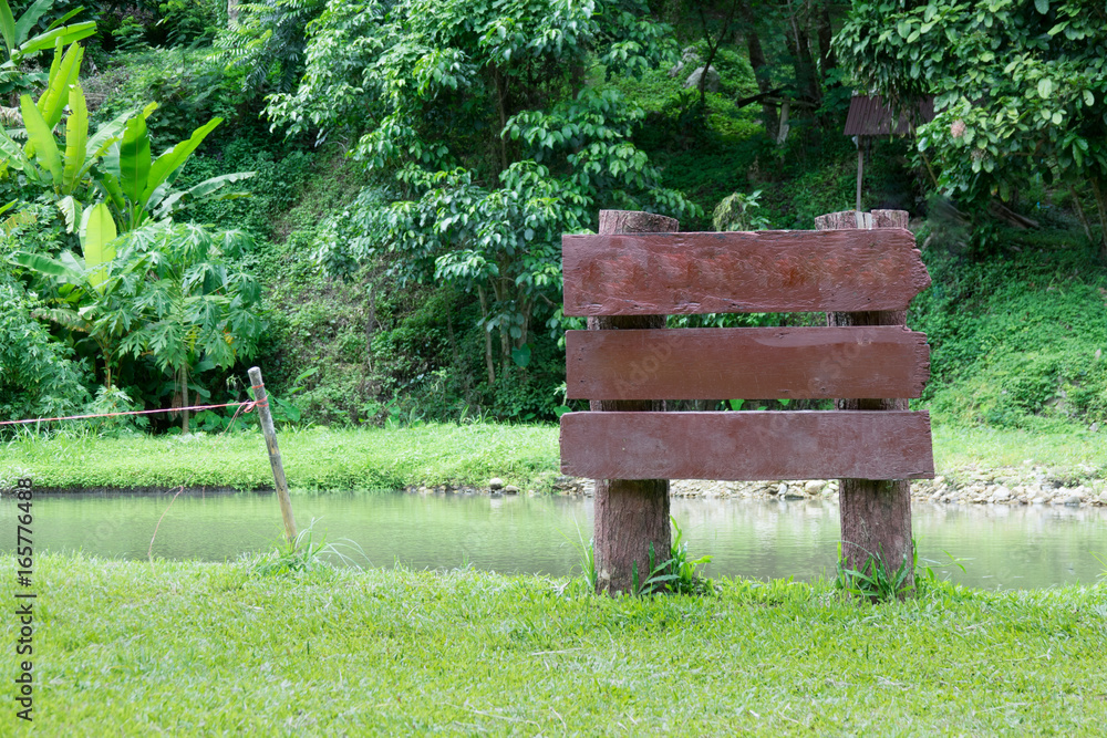 Wooden sign in the park Wooden sign in the park