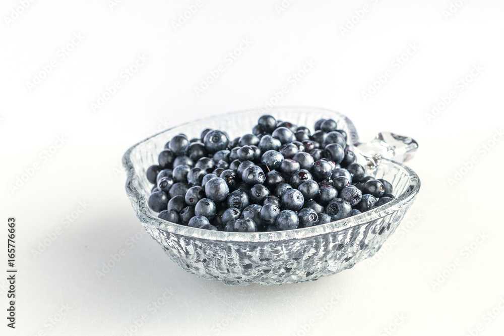 on a white background in a delicious blue bilberries on a white background in a delicious blue bilberries