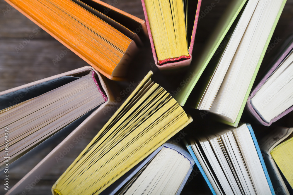 Obraz premium Multicolored books, top view