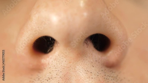 Nostrils of a man's nose