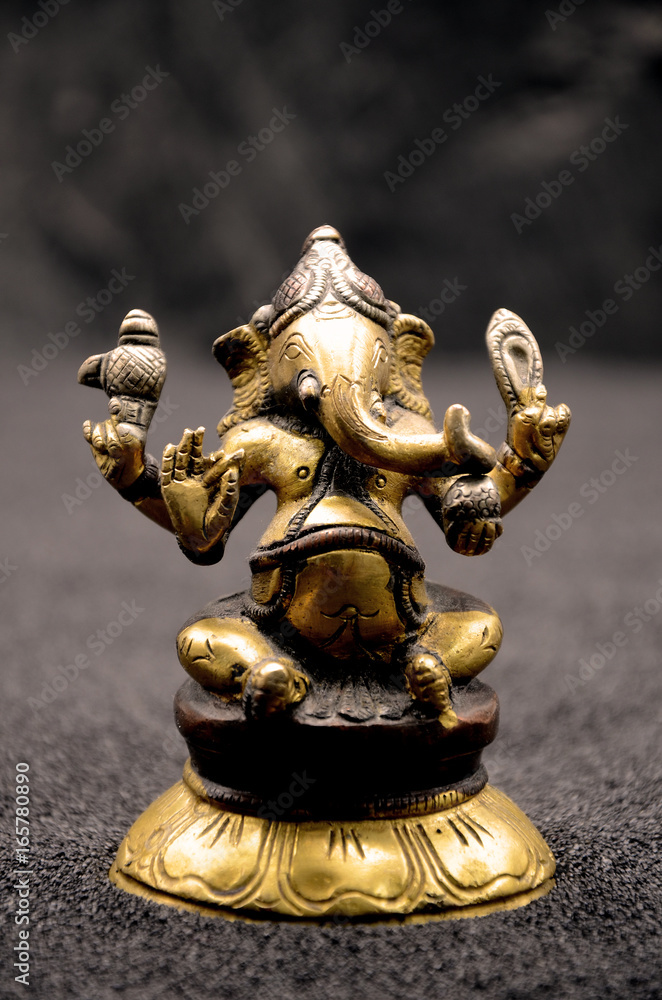 Ganesha on black background close up photo Ganesha on black background close up photo