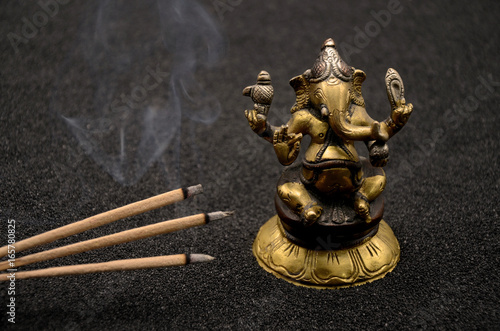 Photography Ganesha on black background close up photo