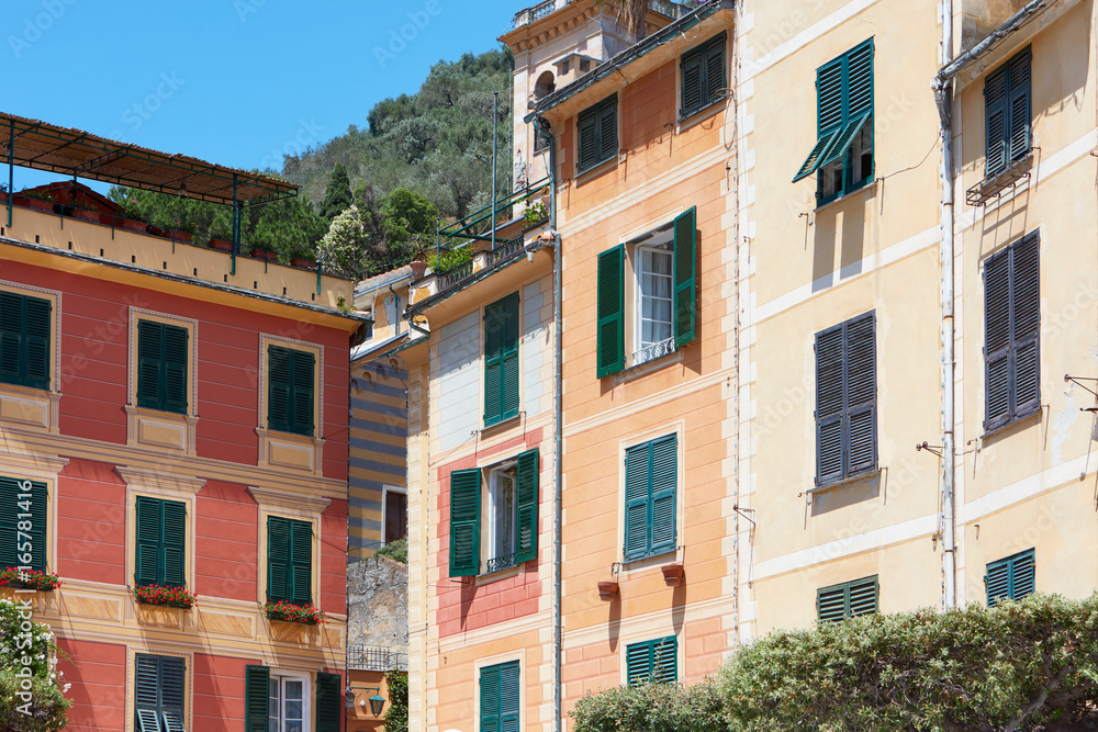 Fototapeta premium Portofino typical colorful houses facades in Italy, Liguria in a sunny day