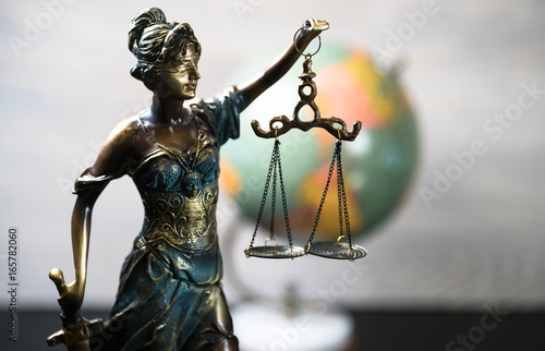 Symbols for balance and power in law and court, selected focus, narrow depth of field