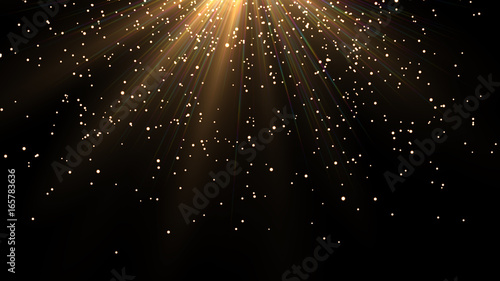 Sprinkle gold dust on a black background with copy space.