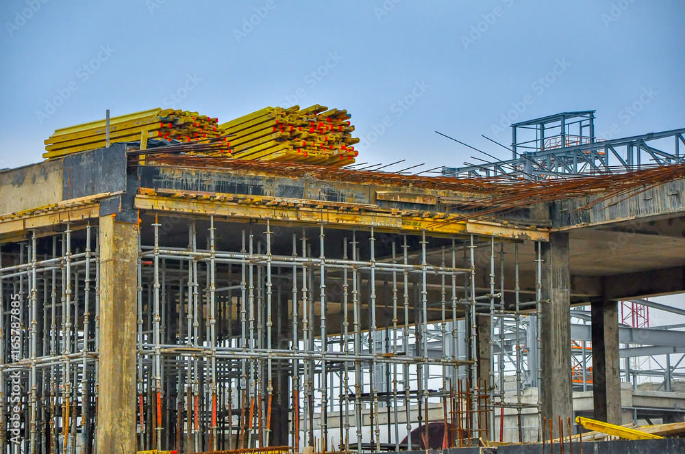 Fototapeta premium building site, construction of concrete designs, iron frame constructions