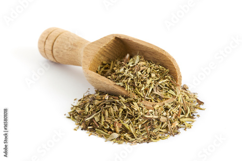 Dried summer savory spice with wooden scoop isolated on white background