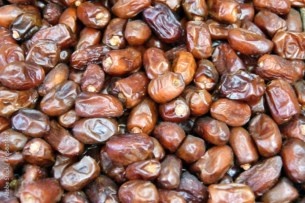 Dates is the edible fruit of some species of date palm Dates is the edible fruit of some species of date palm