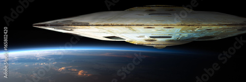 A fleet of massive spaceships known as motherships take position over Earth for a coming invasion at sunrise. photo