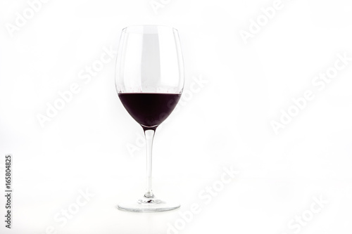 Glass Of Deep Red Wine Isolated On White Background