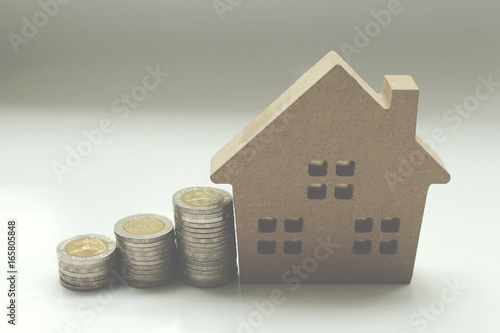 Mortgage loan and Coins of thailand property for concept with copy space