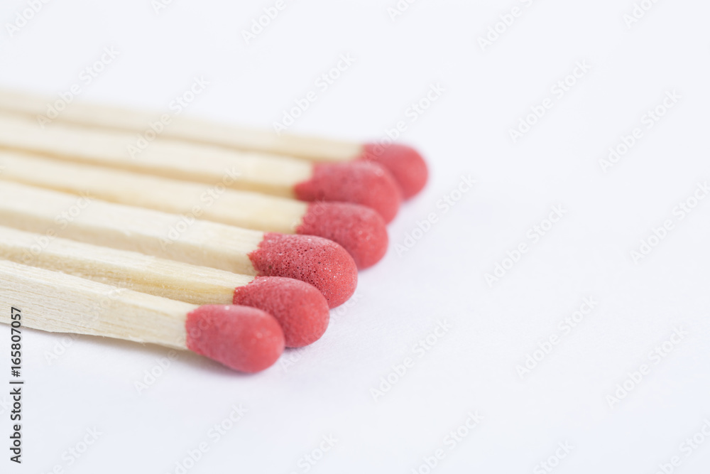 A bunch of matches isolated on white. Closeup. A bunch of matches isolated on white. Closeup.