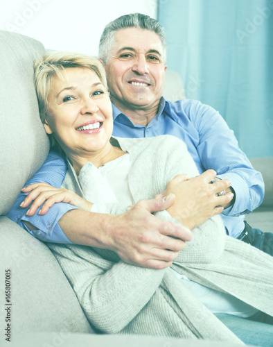 married couple understand and love each other and are happy in house photo