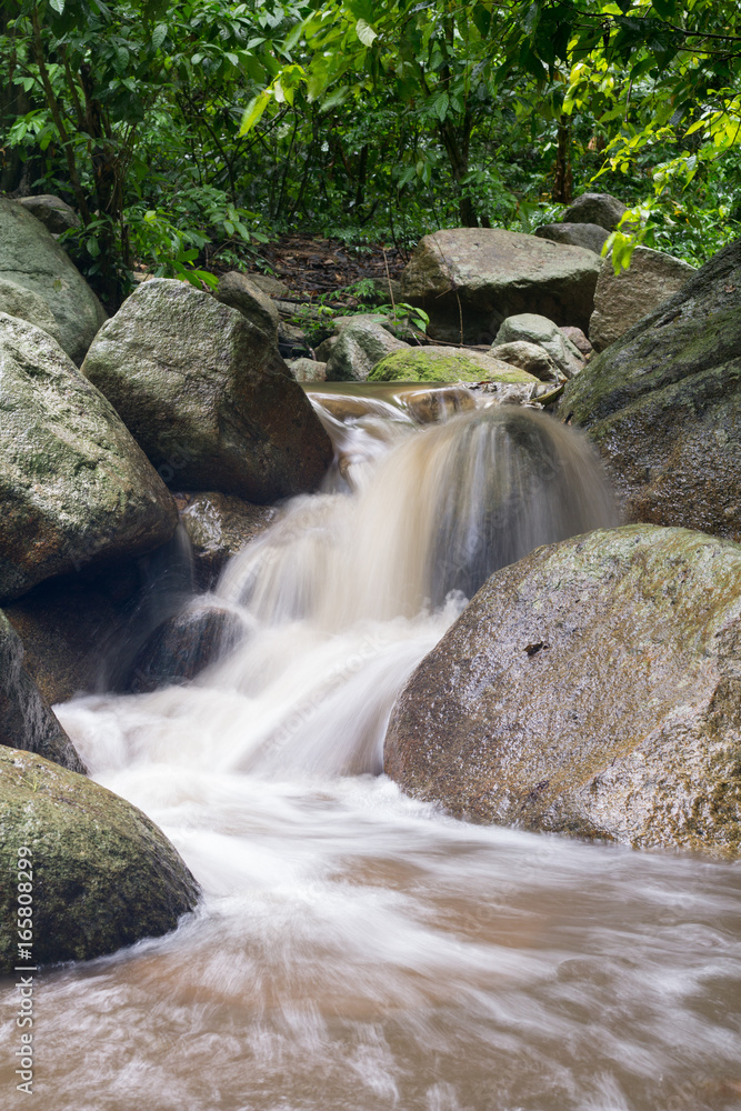 waterfall after rain. waterfall in the forest. waterfall after rain. waterfall in the forest.