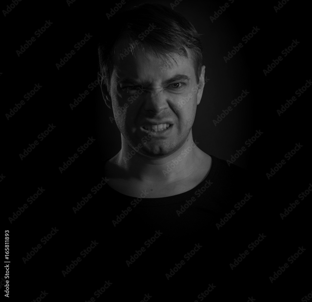 Black and white portrait of a young man. Black and white portrait of a young man.