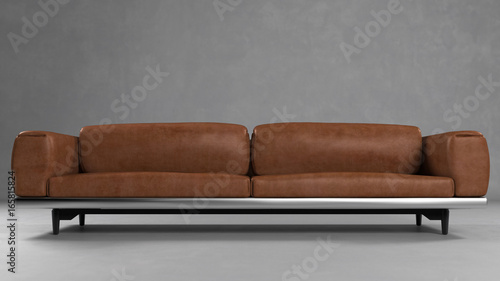 Braunes Sofa aus Leder vor Wand