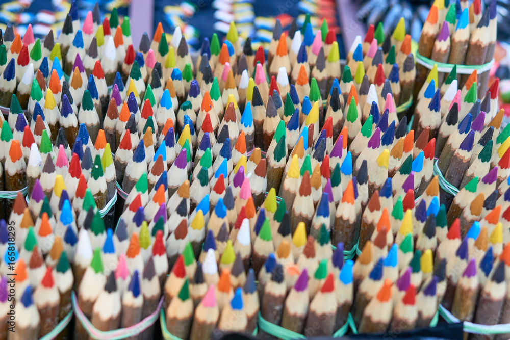 Fototapeta premium bunch of colorful vivid pencils on market