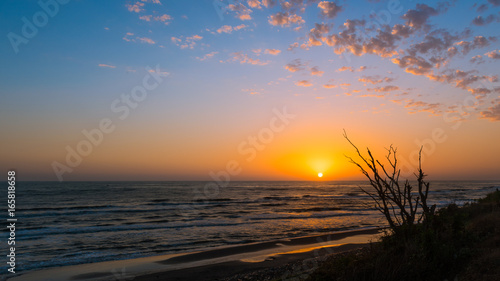 Bright colorful sunrise at sea