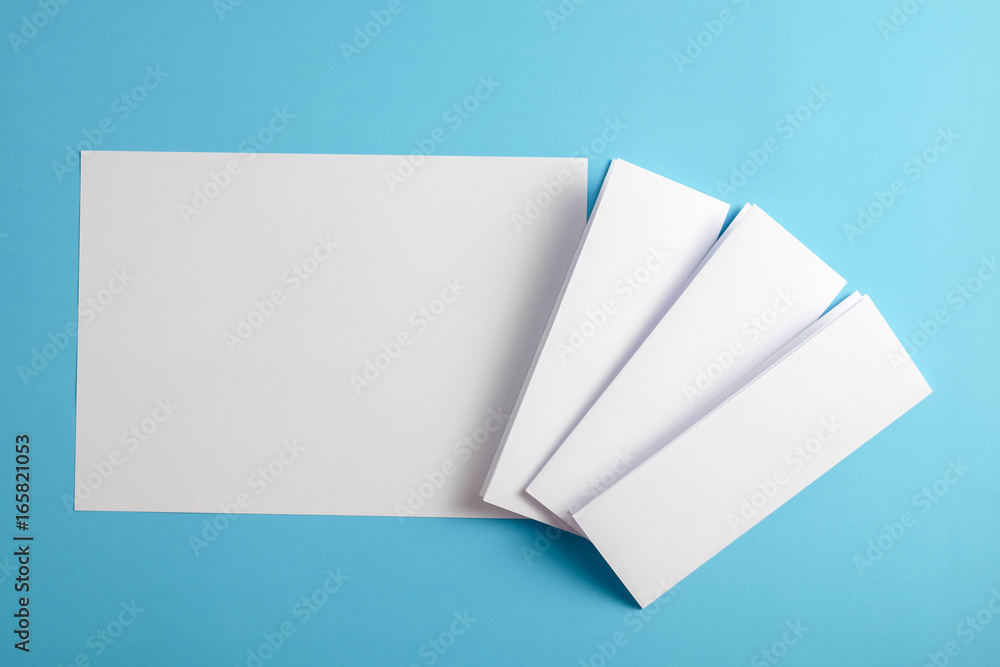 template fold white paper on blue background template fold white paper on blue background