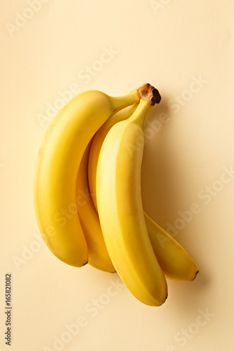 Bananas on a yellow background. Exotic fruit viewed from above. Top view.