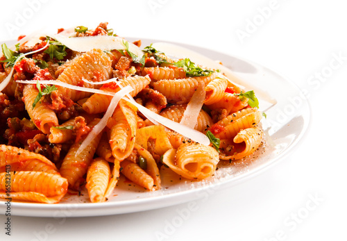 Penne with meat, tomato sauce and vegetables