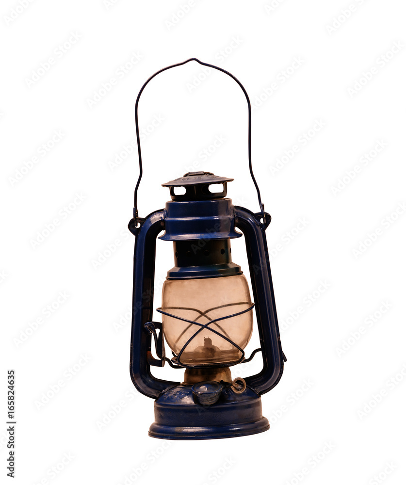 Old kerosene lamp on a white background Old kerosene lamp on a white background