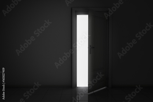 An open door, behind bright light