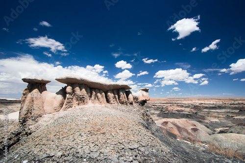 large hoodoo rock formation in a washed out river basin in a rocky desert in the southwest of the USA photo