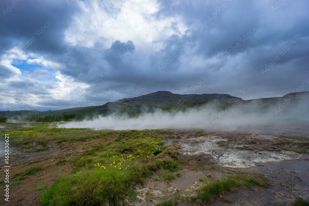 Iceland - Steaming ground of geothermal area at Geyser Strokkur Iceland - Steaming ground of geothermal area at Geyser Strokkur