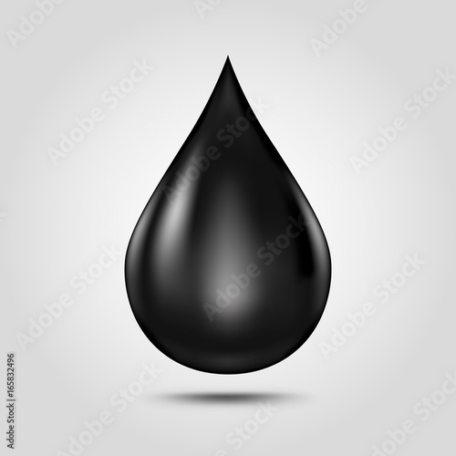Black oil drop isolated on light grey background.