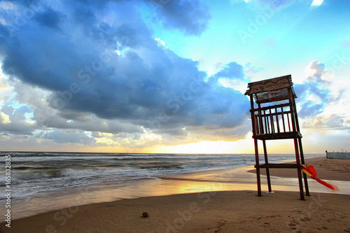 Landscape of beach with the wooden lookout tower