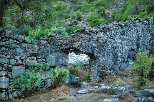 Ruins of temple of Hephaestus. Chimaera Mount. Turkey photo