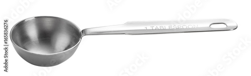 Slika na platnu Metal measuring spoon tablespoon. Isolated on white background.