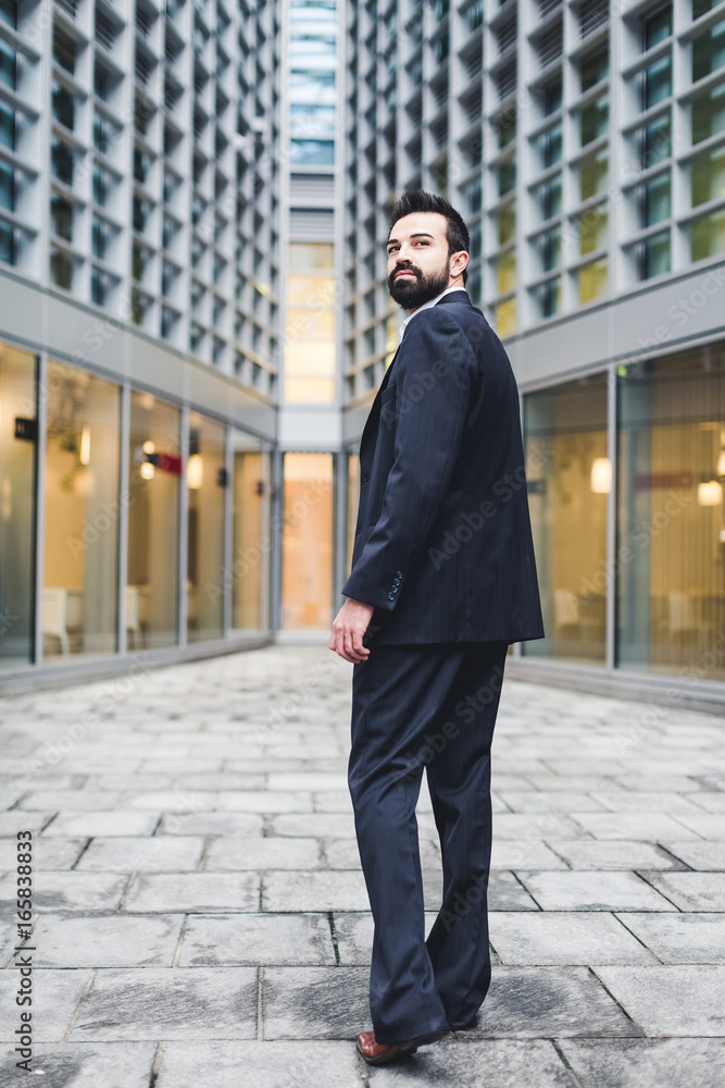 Elegant Businessman walking outdoor Elegant Businessman walking outdoor