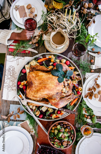 Overhead view of a dinner table set for holiday feast