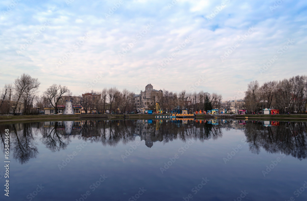 Tomsk city reflextion in the pond