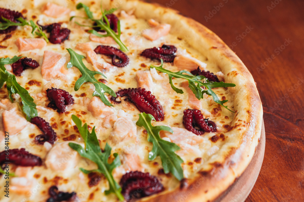 delicious pizza with meat, cheese and mushrooms