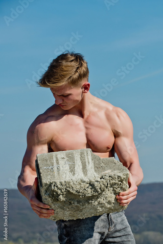 Adam hold bog stone. photo