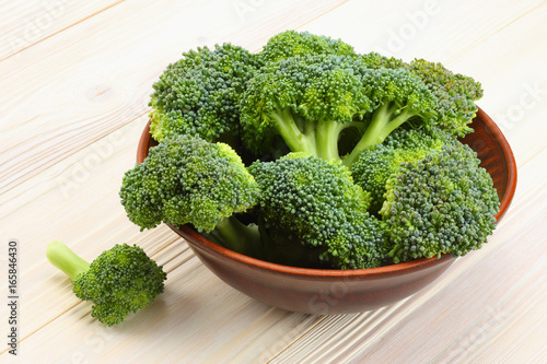 broccoli on white wooden background. top view