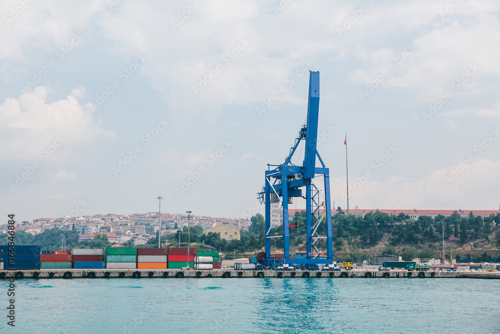 Industrial dock with loading and unloading of sea transport on the Bosporus in Istanbul, Turkey. Transportation, storage, business.