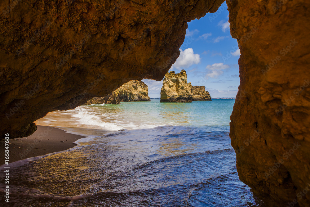 The southern coast of Portugal, the region of the Algarve, beautiful natural beaches with sandy cliffs on the Atlantic coast 