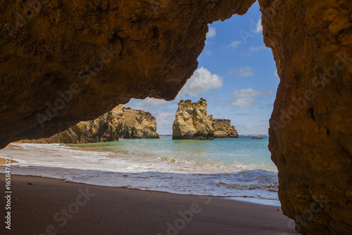 The southern coast of Portugal, the region of the Algarve, beautiful natural beaches with sandy cliffs on the Atlantic coast 