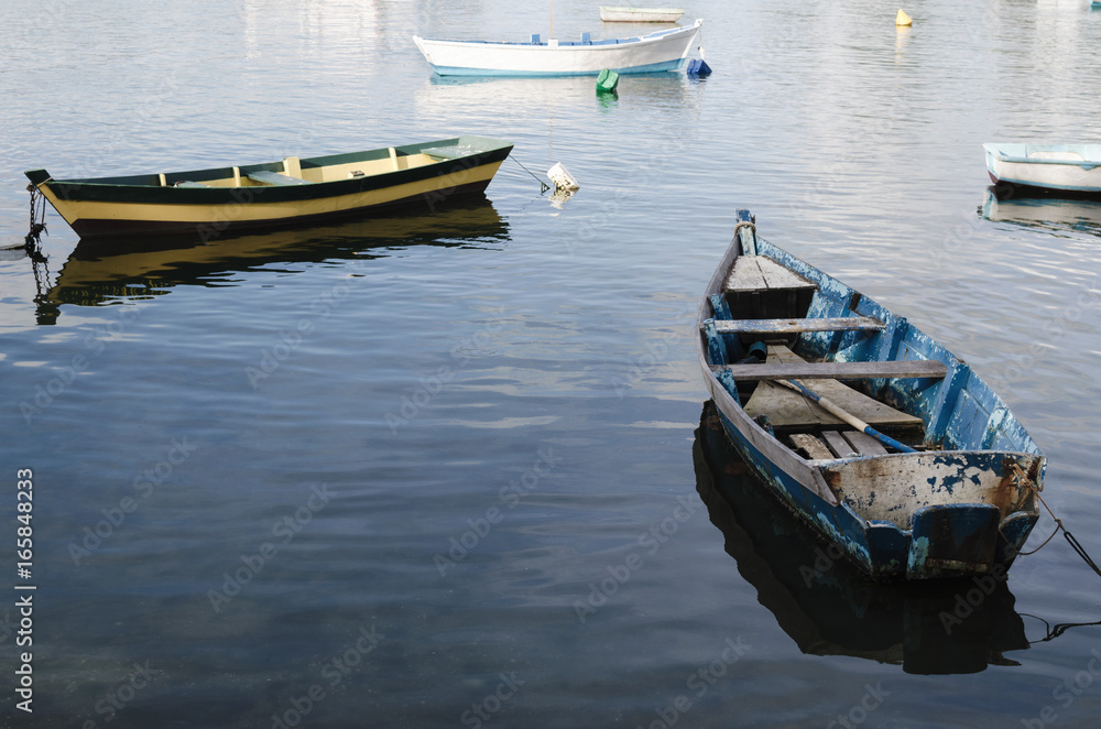 Wooden fishing boats on water