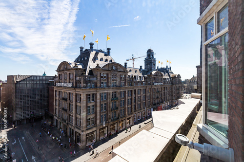 Photography Exterior view of buildings at Damrak street in the old town part of Amsterdam