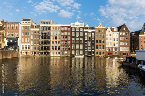 Exterior view of buildings at Damrak street in the old town part of Amsterdam