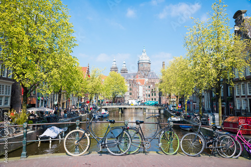 Bicycle on the city street river channel bridge in Amsterdam