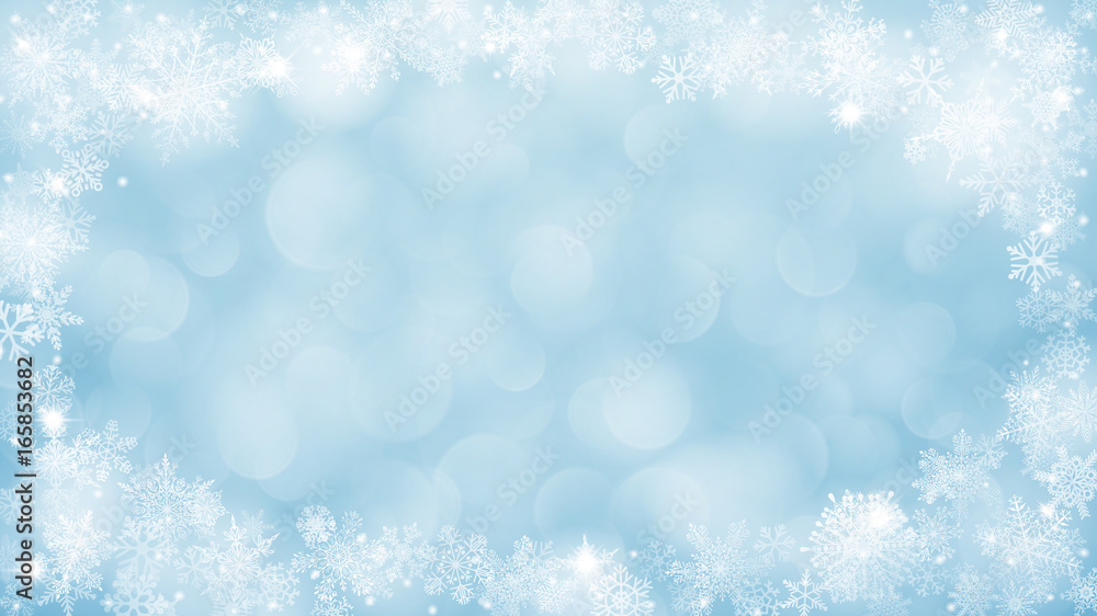Christmas background with frame of snowflakes and bokeh effect in light blue colors
