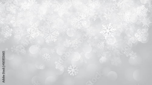 Christmas background of snowflakes with bokeh effect