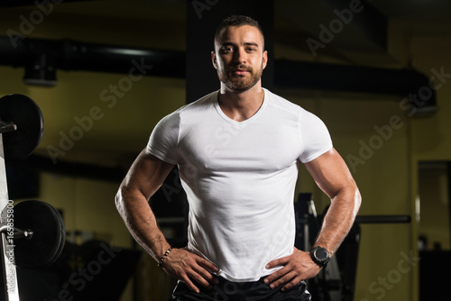 Portrait Of A Fitness Man In White Shirt