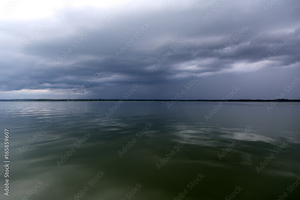 Fototapeta premium Storm and cloudy sky above Polish lake district